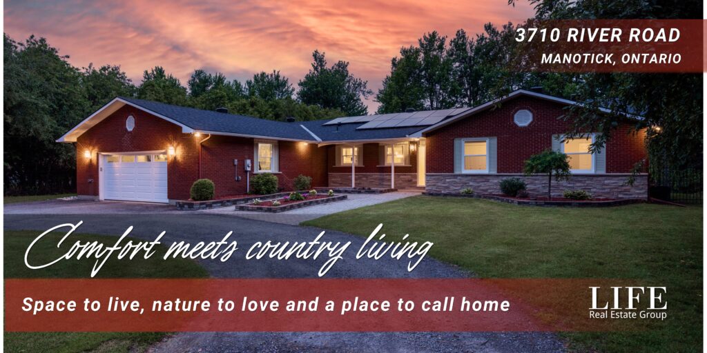 3710 River Road, Manotick waterfront home with modern single-level design, landscaped front yard, and sunset exterior.